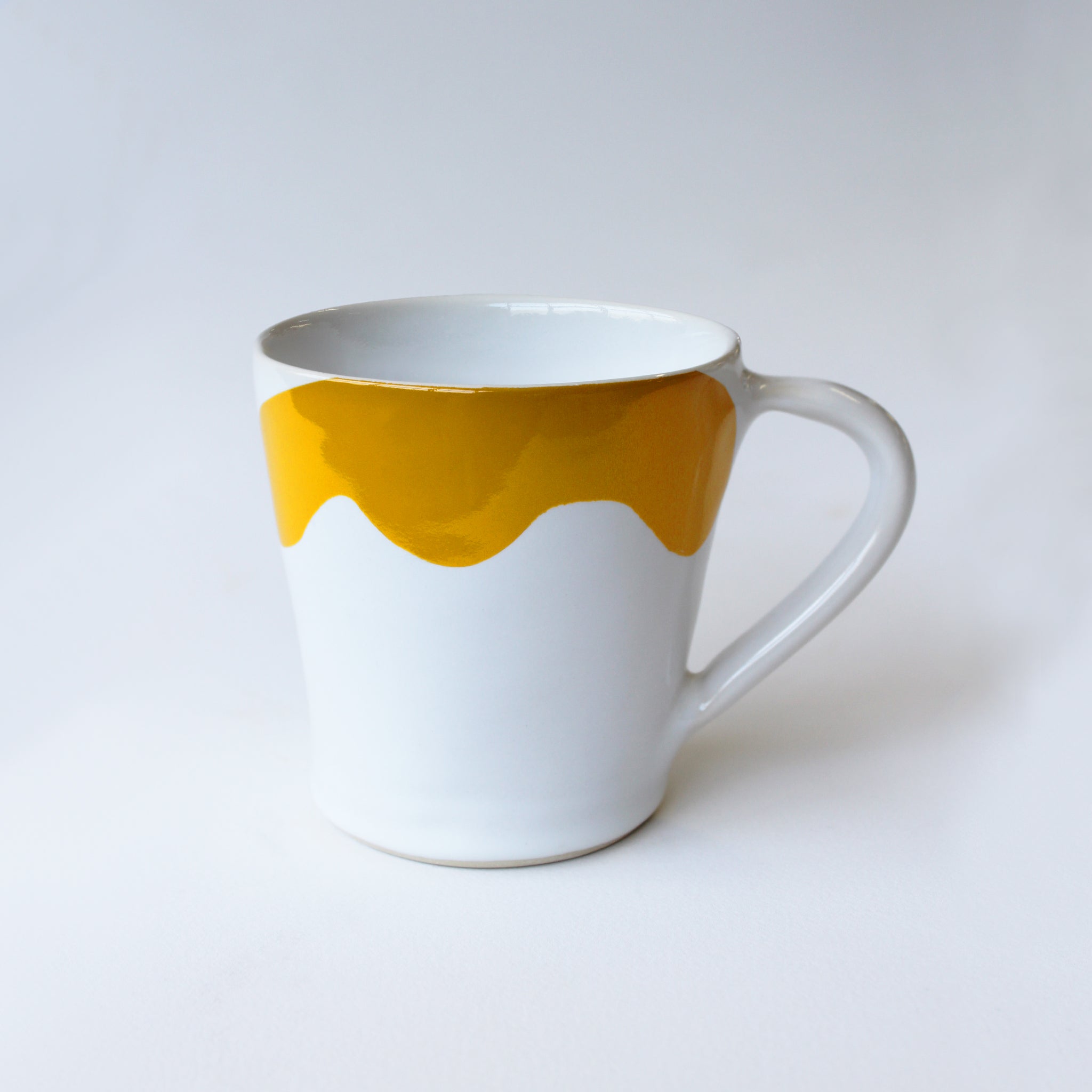 Gloss White Flare Mug accented with hand-applied sweeps of colour, set of 4
