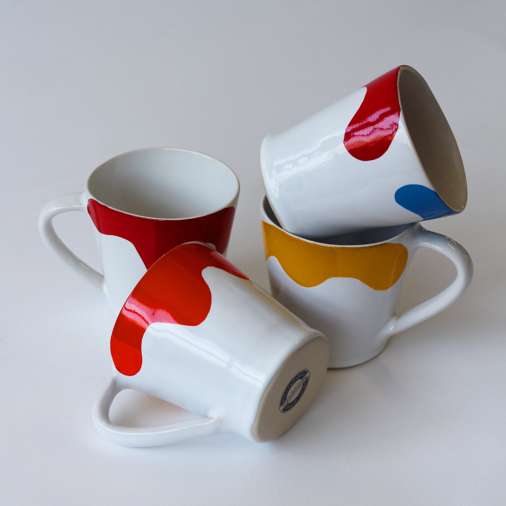 Gloss White Flare Mug accented with hand-applied sweeps of colour, set of 4