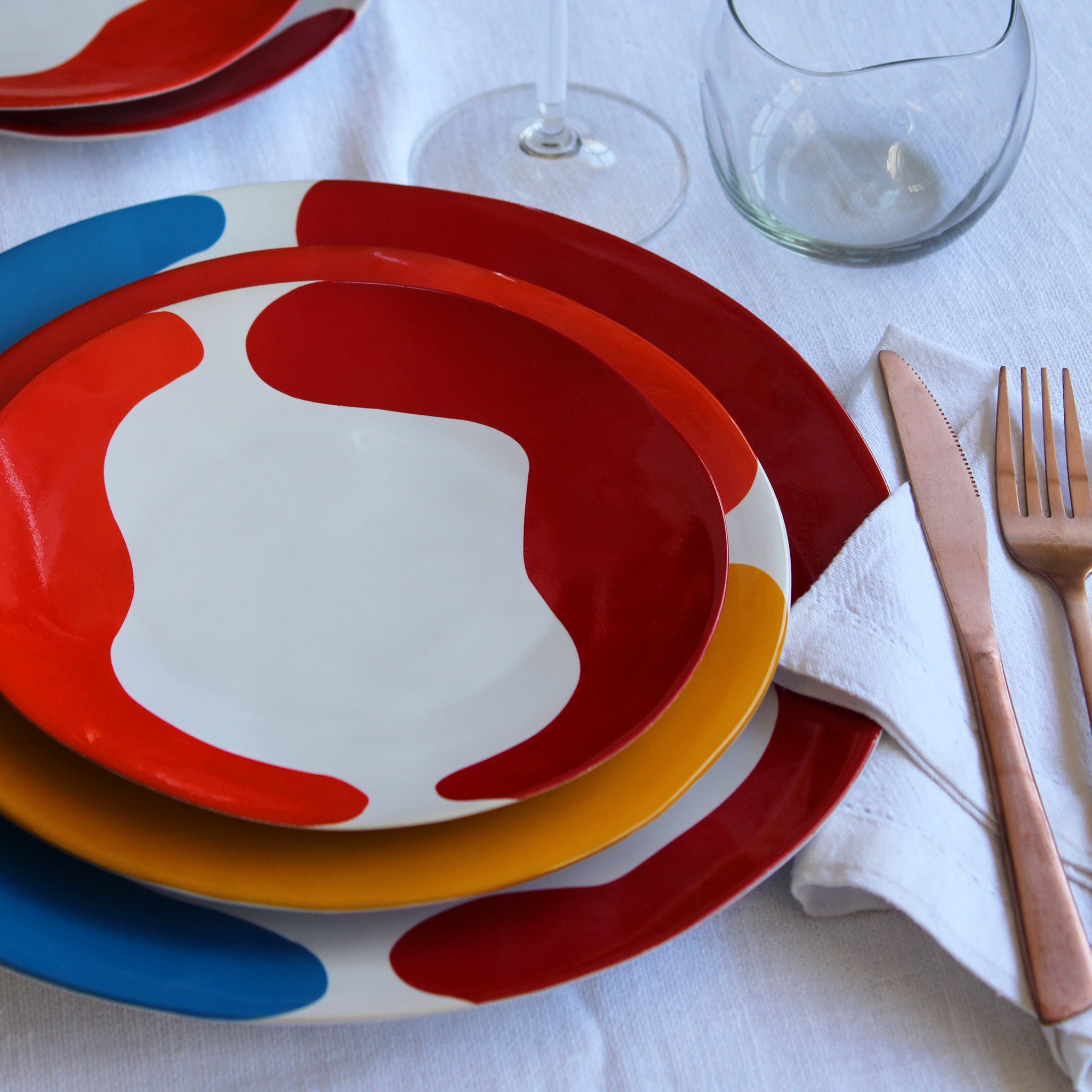 Gloss White Dinner Plates accented with hand-applied sweeps of colour, set of 4