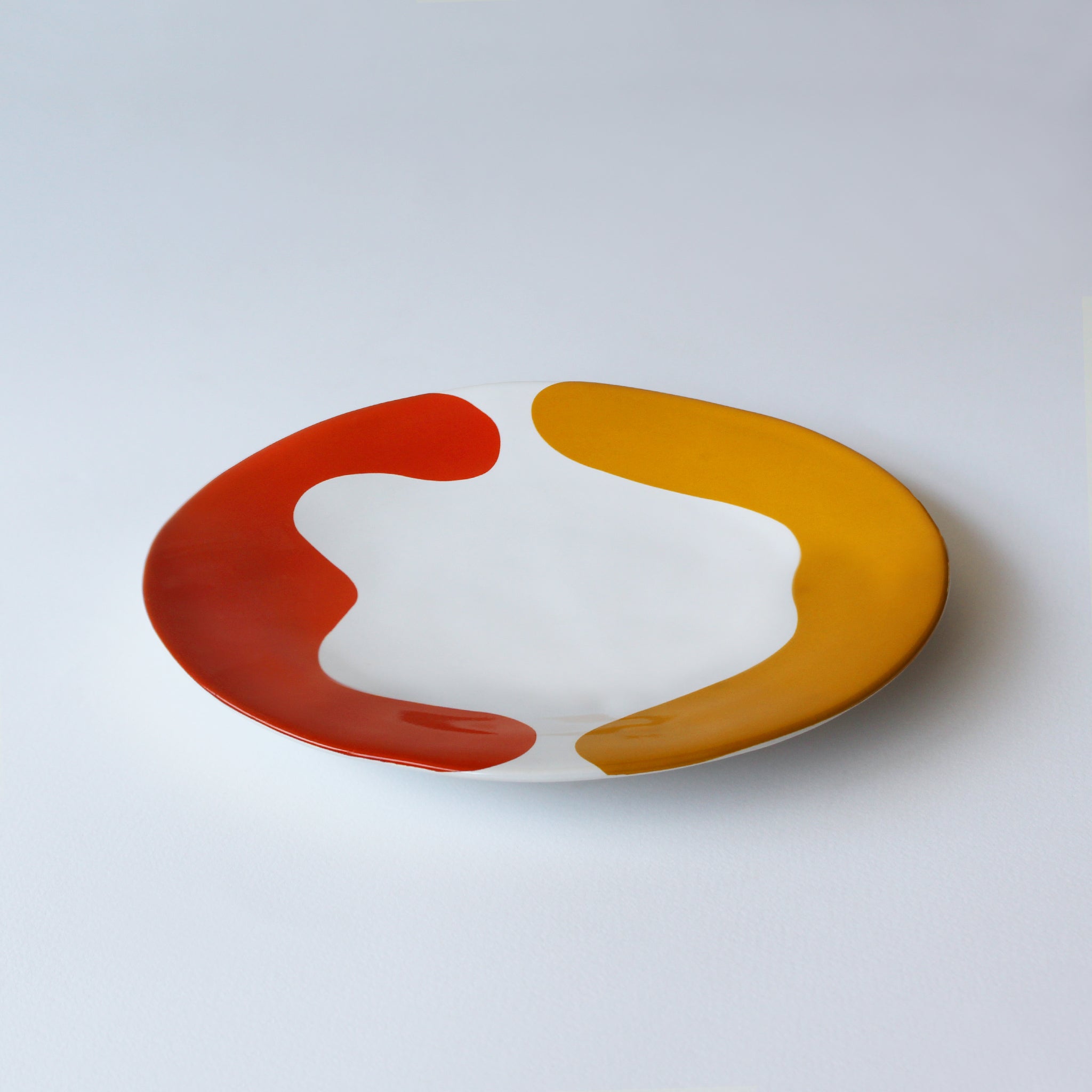 Gloss White Medium Plate accented with hand-applied sweeps of colour, set of 4