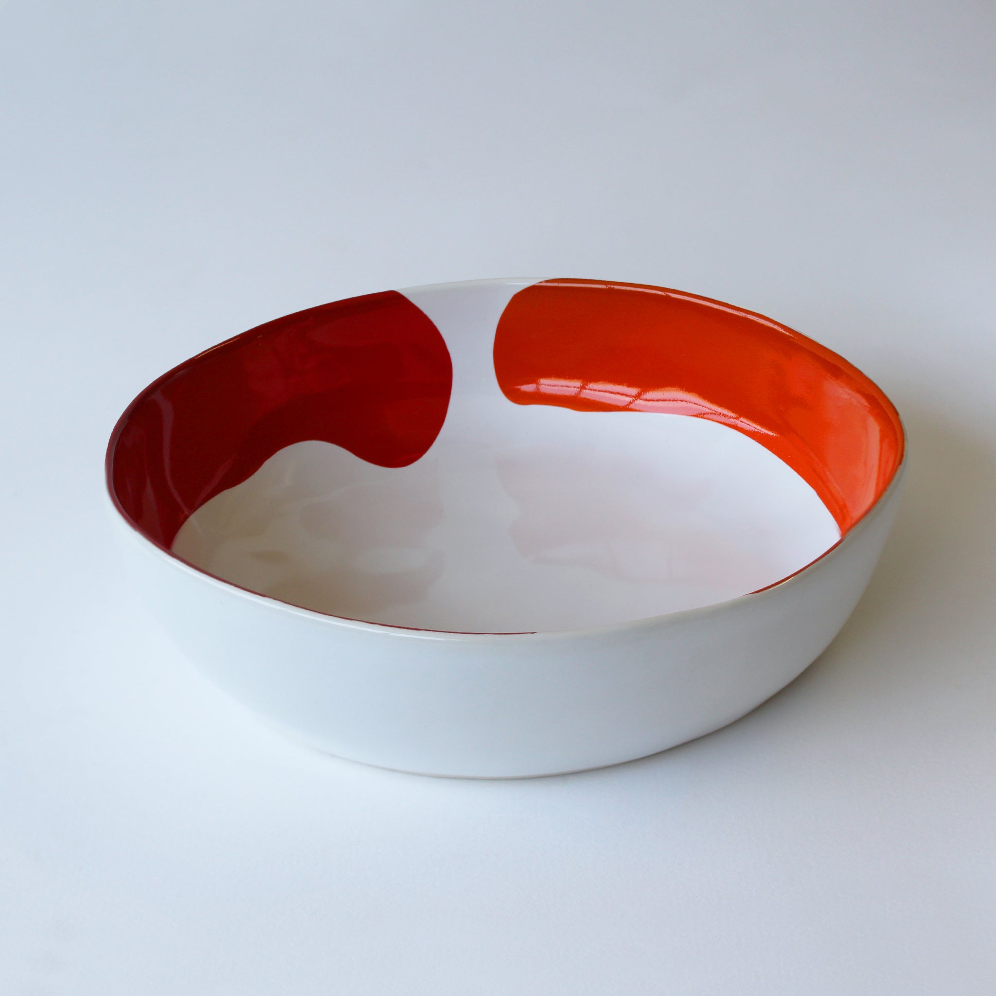 Gloss White Oyster Bowl accented with hand-applied sweeps of colour