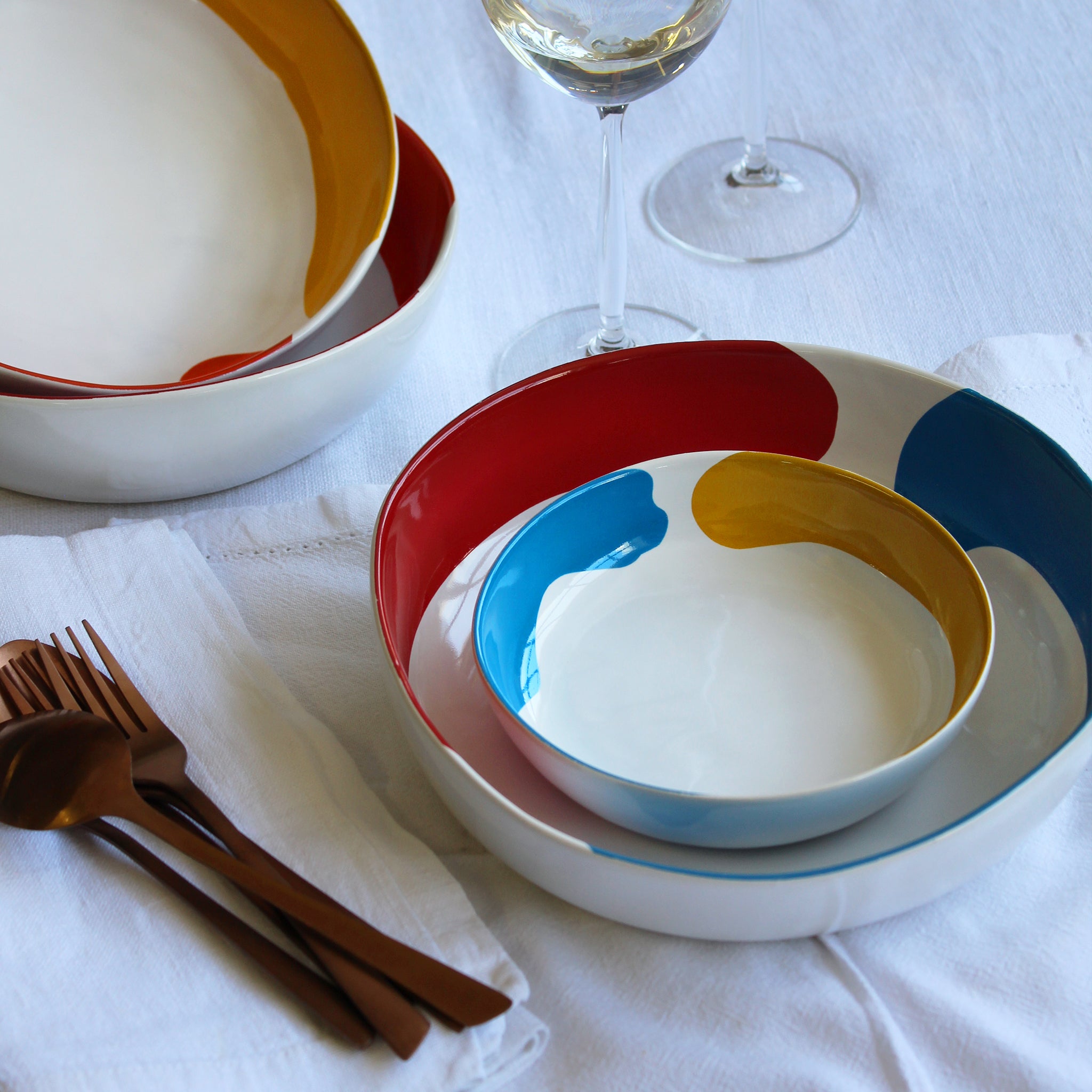 Gloss White Oyster Bowl accented with hand-applied sweeps of colour