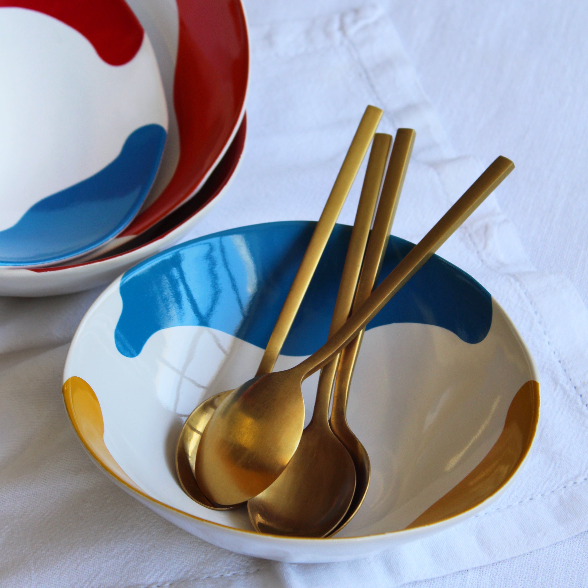 Gloss White WL Bowl accented with hand-applied sweeps of colour, set of 4